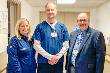 Gavin Zakarevicz, RN, (center) is the recipient of Beebe Healthcare’s May 2019 L.O.V.E. Letter. Also pictured are Loretta Ostroski, Director of Patient Care Services, left, and Rick Schaffner, Interim CEO, Executive VP & Chief Operating Officer.