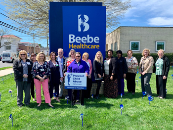 Beebe Healthcare employees gathered on Tuesday, April 16, to plant pinwheels on the front lawn of the Margaret H. Rollins Lewes Campus to recognize Child Abuse Prevention Month. 