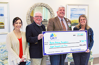 Quiet Resorts Charitable Foundation Board Members, Christina Antonioli and Ron Lewis; David Szumski, Beebe Medical Foundation; and Laurie McFaul, President of the QRCF.