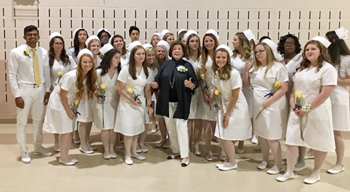 The Margaret H. Rollins School of Nursing class of 2018 celebrates with Peggy Rollins at the ceremony. In 2011, Randall and Peggy Rollins donated $3 million through their Ma-Ran Foundation toward the expansion and naming of Beebe Healthcare’s Margaret H. 