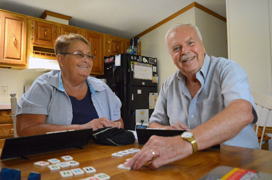 Charley and Mary Senick enjoy playing Rummikub at home after Charley's lung surgery.